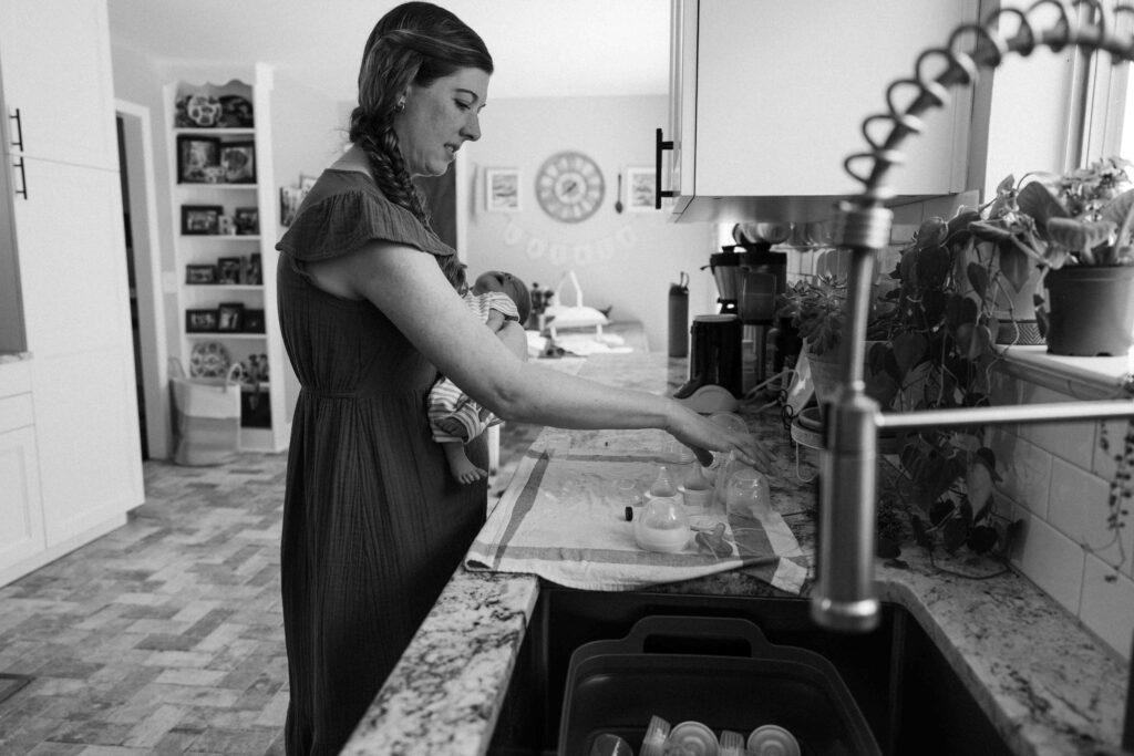 mom in kitchen holding baby